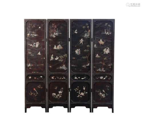 A CHINESE BLACK LACQUER EIGHTEEN LUOHAN FOUR-FOLD SCREEN LAT...