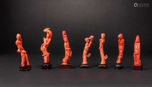 SEVEN CHINESE CORAL CARVINGS OF FEMALE DEITIES AND A BOY QIN...