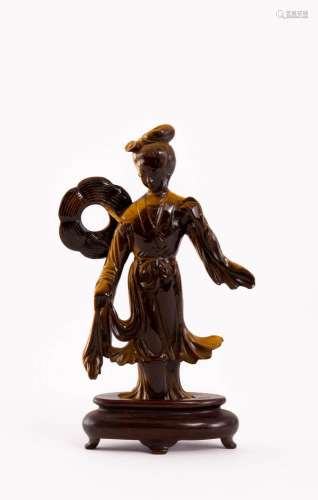 A CHINESE TIGER`S EYE FIGURE OF MAGU QING DYNASTY Standing, ...