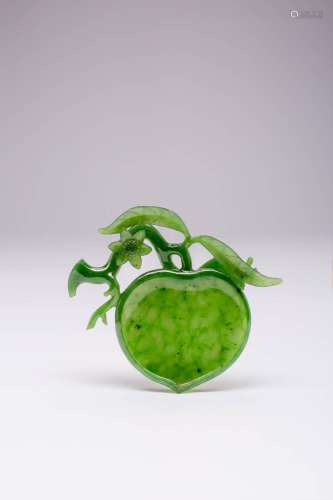 A CHINESE SPINACH-GREEN JADE `PEACH` WASHER QING DYNASTY Car...