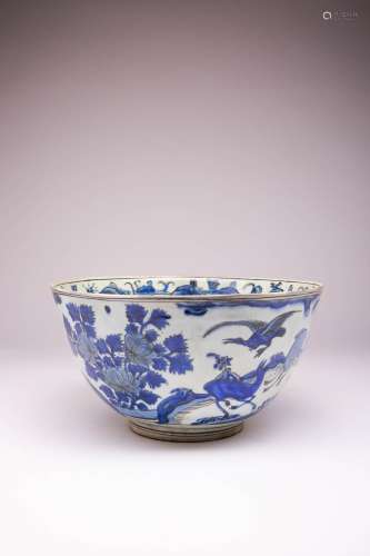 AN IRANIAN FRITWARE BLUE AND WHITE BOWL 17TH CENTURY Depicti...
