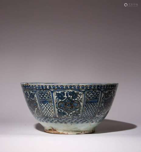 A LARGE SAFAVID BLUE AND WHITE BOWL 17TH/18TH CENTURY Rising...