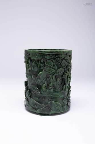 A CHINESE CARVED SPINACH-GREEN JADE BRUSHPOT, BITONG QING DY...