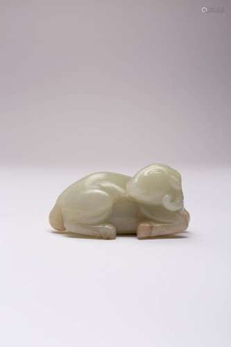 A CHINESE PALE CELADON JADE CARVING OF A RECUMBENT RAM QING ...