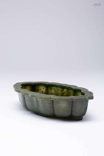 A CHINESE SPINACH-GREEN JADE MUGHAL STYLE BOWL LATE QING DYN...
