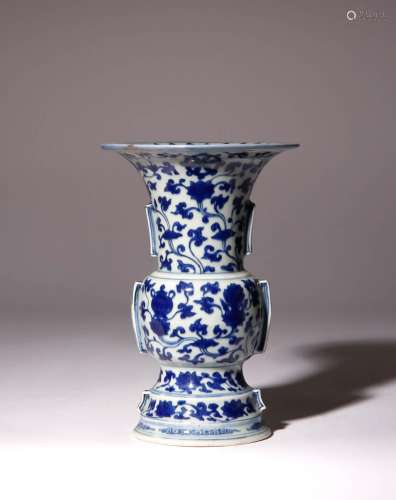 A CHINESE BLUE AND WHITE ARCHAISTIC GU-SHAPED VASE 19TH CENT...