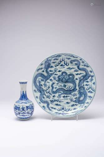 A CHINESE BLUE AND WHITE `DRAGON` DISH AND A BOTTLE VASE LAT...