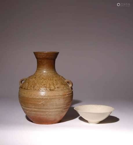 A CHINESE YUE CELADON HU-SHAPED VASE AND A QINGBAI FOLIATE B...