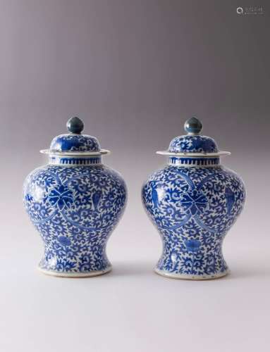 A PAIR OF CHINESE BLUE AND WHITE BALUSTER VASES AND COVERS 1...