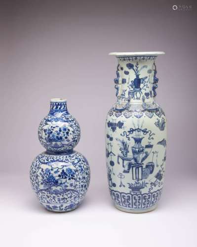 TWO CHINESE BLUE AND WHITE VASES 19TH CENTURY The larger of ...