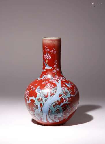 A CHINESE FAMILLE ROSE COPPER-RED GROUND BOTTLE VASE 19TH CE...