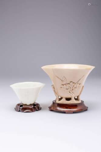TWO CHINESE BLANC DE CHINE LIBATION CUPS 17TH CENTURY AND LA...