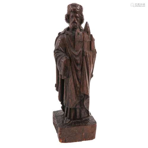 A Carved Oak Sculpture Depicting Saint Willibrord