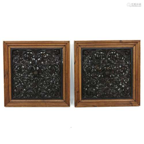 A Pair of Carved Wood Panels