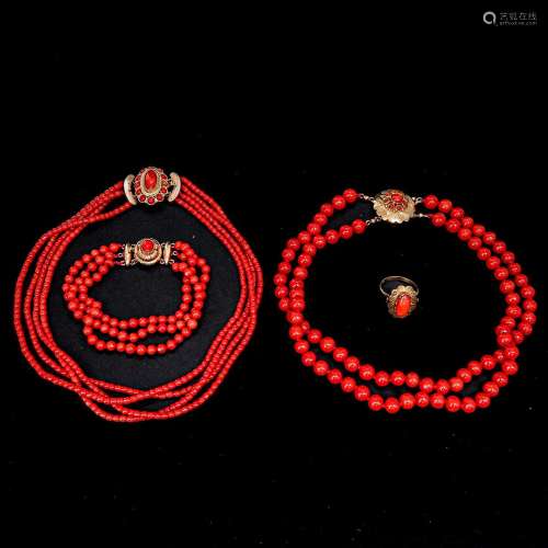 A Collection of Red Coral Jewelry
