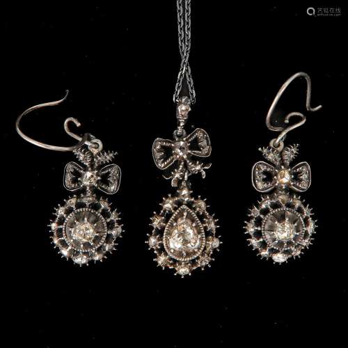 A Diamond Necklace and Earrings