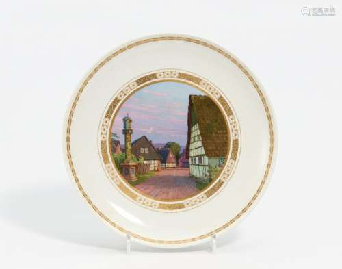 Plate with village view and gold enamel decor