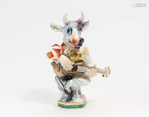 Guitar player with bull mask
