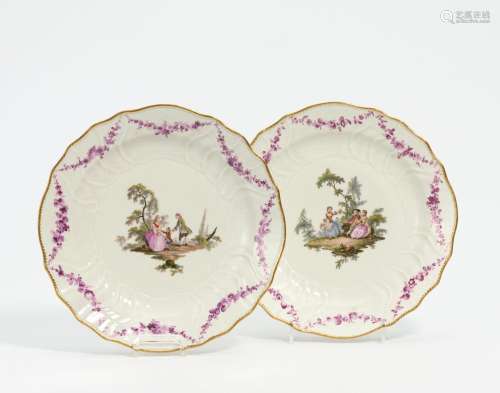 Pair of soup plates with Watteau scenes
