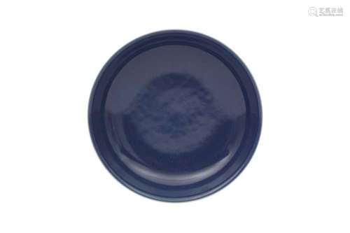 A CHINESE BLUE-GLAZED DISH