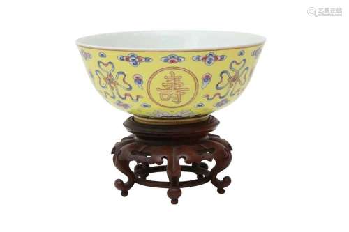 A CHINESE FAMILLE-ROSE YELLOW-GROUND BOWL