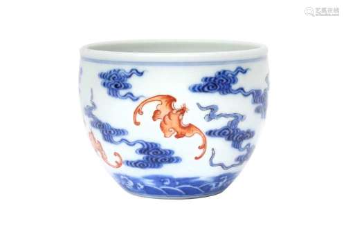 A CHINESE BLUE AND WHITE AND IRON-RED `WUFU` CUP