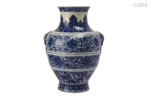 A CHINESE BLUE AND WHITE `LOTUS` VASE
