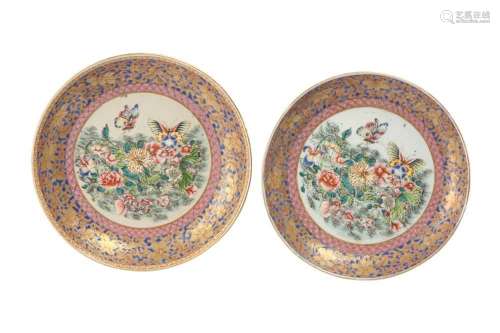 A CHINESE NEAR-PAIR OF FAMILLE-ROSE `BUTTERFLY AND FLOWER` D...