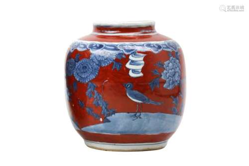 A CHINESE BLUE AND WHITE AND A RED-GLAZED JAR