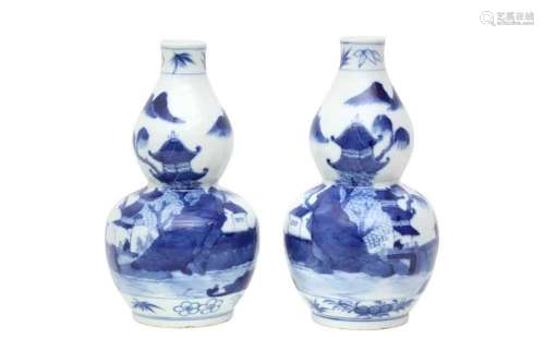 A PAIR OF CHINESE BLUE AND WHITE DOUBLE GOURD `LANDSCAPE` VA...
