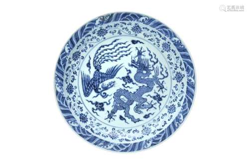 A CHINESE BLUE AND WHITE `DRAGON AND PHOENIX` CHARGER