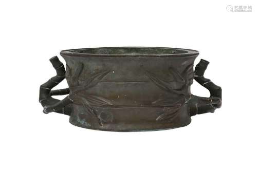 A CHINESE BRONZE `BAMBOO` INCENSE BURNER.