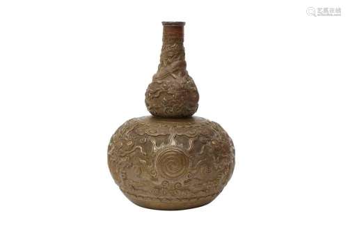 A CHINESE BRONZE DOUBLE-GOURD `DRAGON` VASE