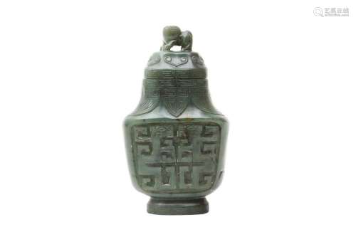 A CHINESE SPINACH-GREEN JADE ARCHAISTIC VASE AND COVER