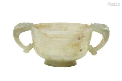 A CHINESE CELADON JADE TWIN-HANDLED CUP