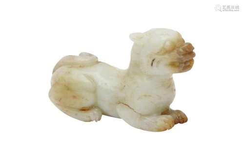 A CHINESE PALE CELADON JADE CARVING OF A DOG
