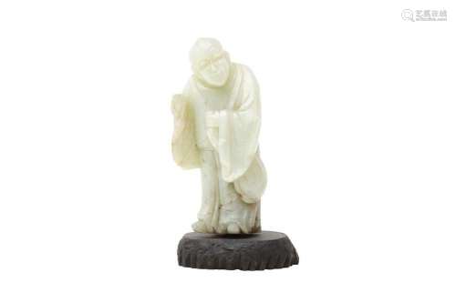 A CHINESE PALE CELADON JADE FIGURE OF A MONK