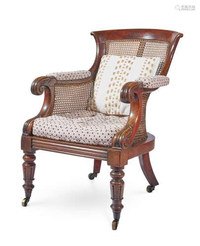 A GEORGE IV MAHOGANY LIBRARY BERGÈRE ARMCHAIR, ATTRIBUTED TO...