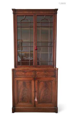 A GEORGE IV MAHOGANY BOOKCASE, IN THE MANNER OF GILLOWS, CIR...