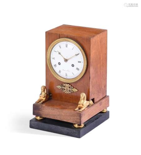 AN EMPIRE MAHOGANY AND GILT METAL MOUNTED MANTEL CLOCK, BY S...