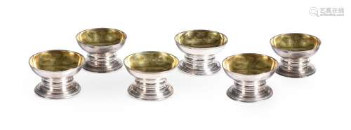 A SET OF SIX GEORGE II SILVER TRENCH SALTS, MAKERS MARK OBSC...