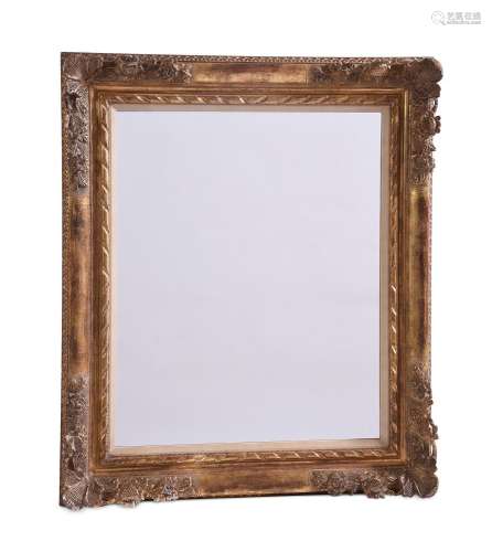 A CARVED GILTWOOD PICTURE FRAME WALL MIRROR,  IN VICTORIAN S...