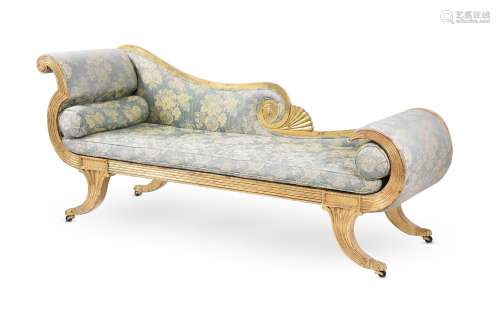 A REGENCY GILTWOOD AND UPHOLSTERED CHAISE LONGUE, IN THE MAN...