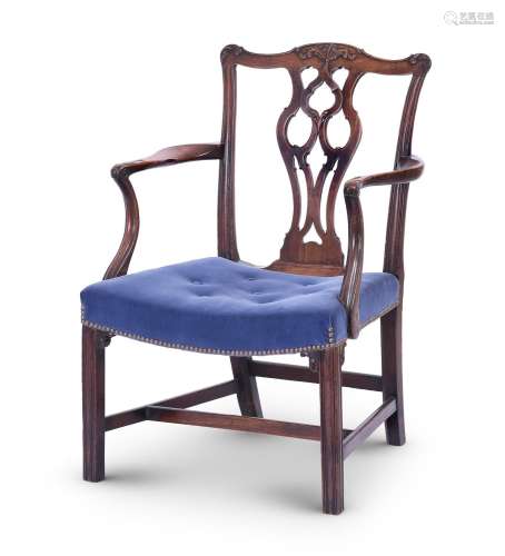 A GEORGE III MAHOGANY OPEN ARMCHAIR, IN THE MANNER OF THOMAS...