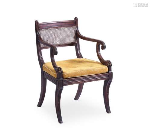A REGENCY CARVED MAHOGANY OPEN ARMCHAIR, IN THE MANNER OF MA...