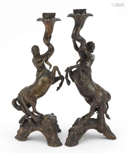 Pair of 19th century style patinated bronze candlesticks in ...
