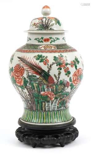 Chinese porcelain baluster vase and cover raised on carved h...