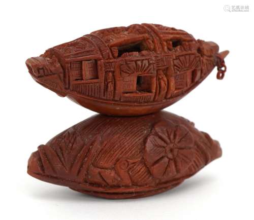Good Chinese carved coquilla nut junk with opening windows a...