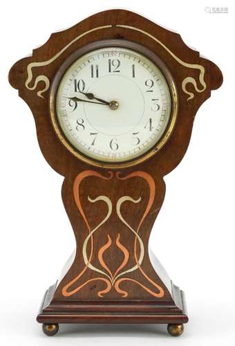 Art Nouveau mahogany mantle clock with copper and white meta...