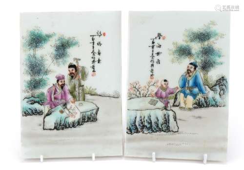 Pair of Chinese porcelain panels hand painted in the famille...